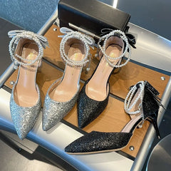 French new pointy shallow mouth temperament elegant sequin bow high heels women's fine heel pearl line with a single shoe